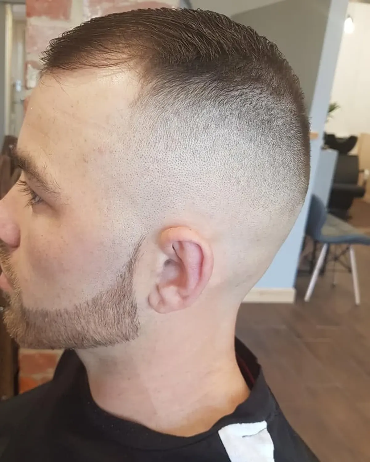 High skin fade with a short tapered top and tidied beard, cut at Primo Hair Lounge Ipswich