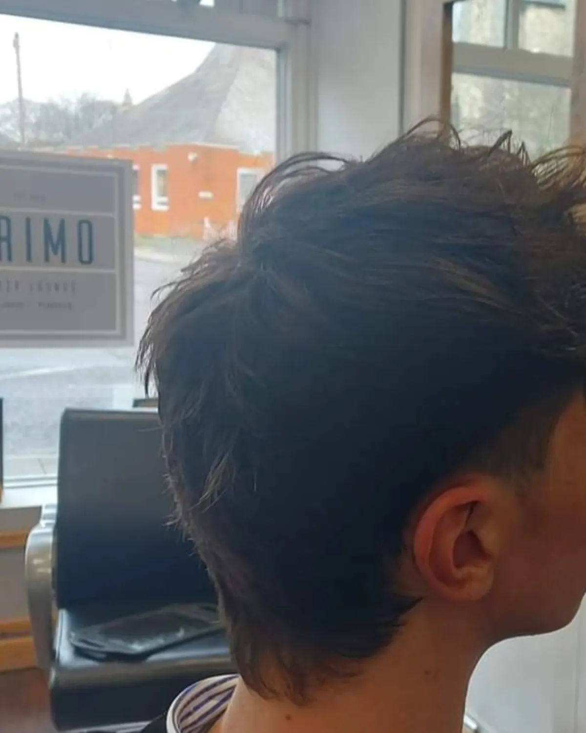 Layered textured mullet with a tapered nape, cut at Primo Hair Lounge Ipswich